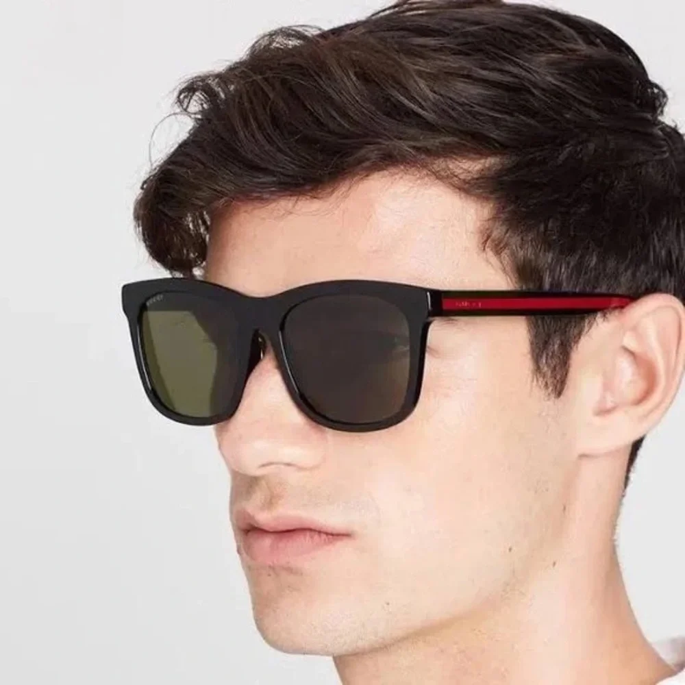 New Authentic GG0057SKN 002 Gucci Black Sunglasses with Green Lenses